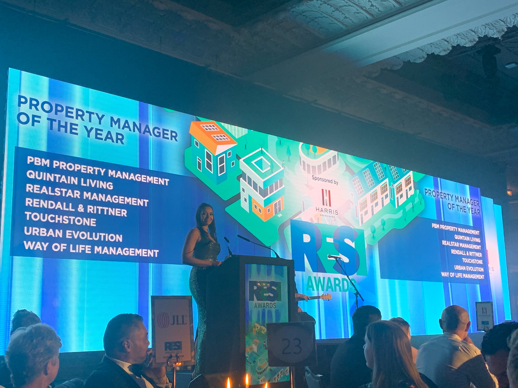 Chioma Ibe handing out an award at RESI Awards